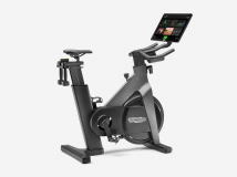 Интерактивный вертикальный велотренажер TECHNOGYM Bike